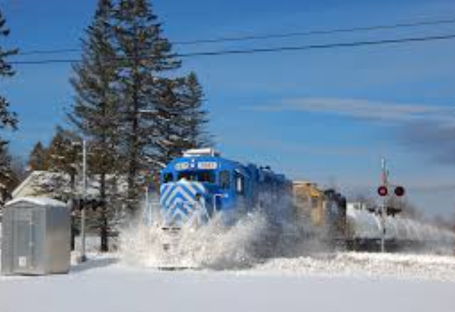 Train Traveling through deep snow